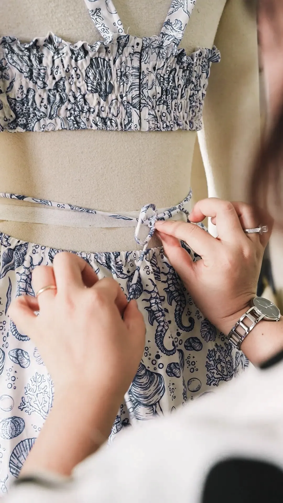 Quality inspector checking a garment seam